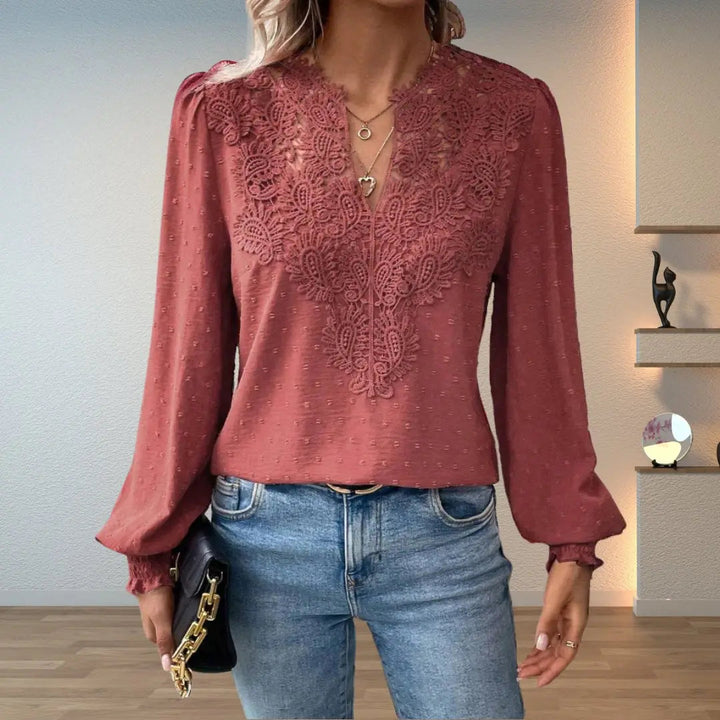 Flowy women's elegant blouse, intricate pattern, long sleeves, V-neckline & delicate lace smocked cuffs.