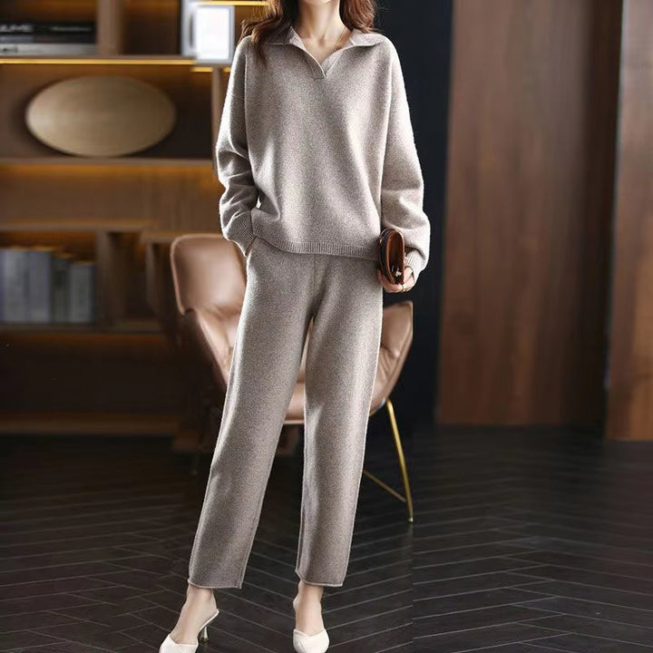 Full shot of a woman in a sandstone cashmere knitwear set, emphasizing breathable comfort.