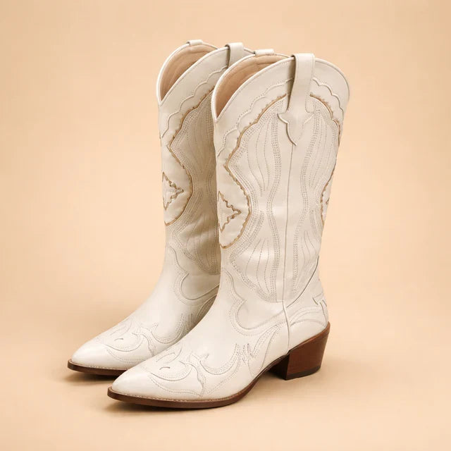 Women's knee-high cowboy boots with intricate embroidery, perfect for western fashion & country style outfits. Stylish footwear.