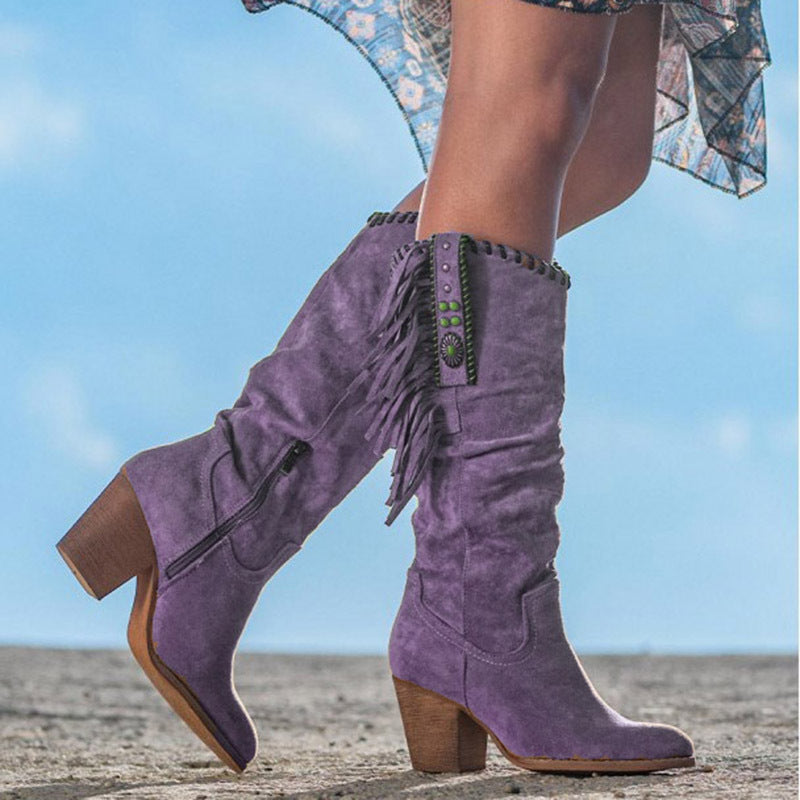 Stylish women's fringe cowboy boots with a comfortable block heel, ideal for festivals & fall fashion.