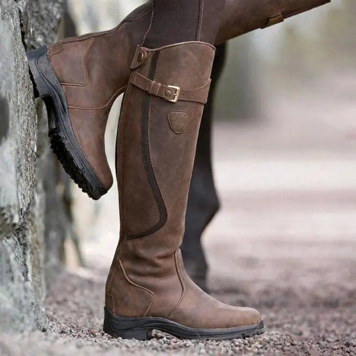 Elegant women's knee high fashion boots. Waterproof & weather-resistant with convenient side zip. Perfect for tall casual wear.