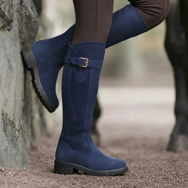 Tall women's knee high boots. Waterproof and weather-resistant with an easy side zip, perfect for autumn/winter fashion.