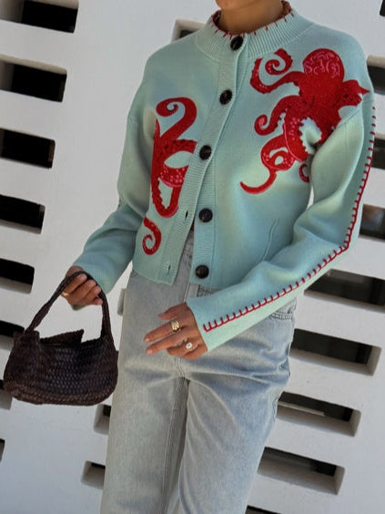 Casual women's octopus graphic knit cardigan. Button front, long sleeve, for a unique layered look.
