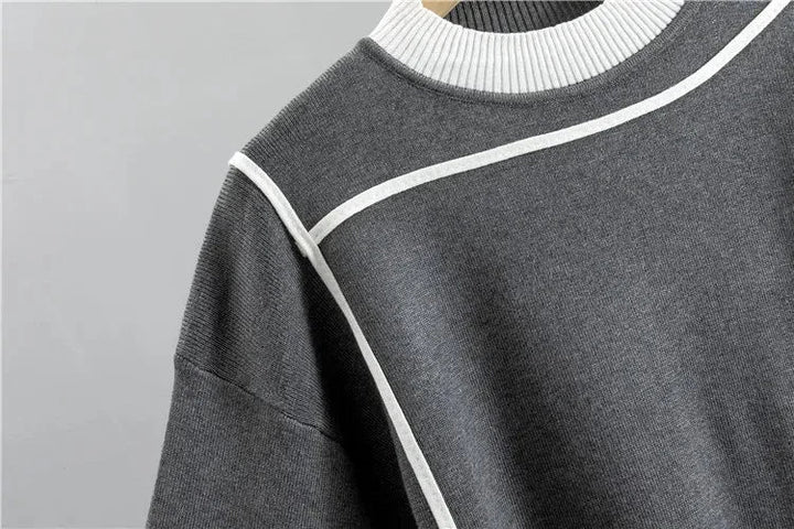 Women's color-block knit tracksuit featuring a mock-neck top and tapered pants, perfect loungewear.