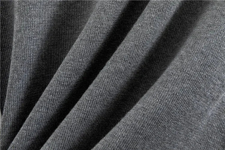 Soft knit color-block women's tracksuit. Mock-neck top, tapered pants. Ideal matching loungewear set.