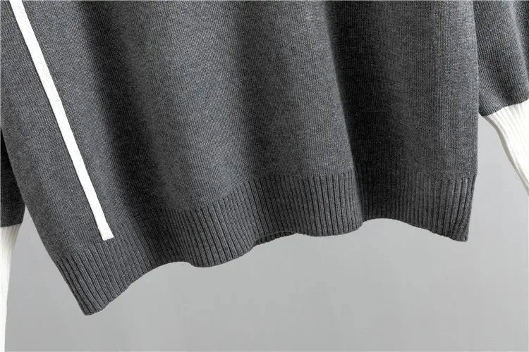 Women's color-block activewear knit tracksuit. Mock-neck top & tapered pants. Stylish matching set.