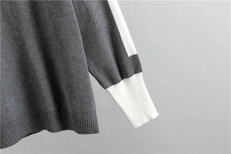 Casual chic women's color-block knit tracksuit with mock-neck top and tapered loungewear pants.