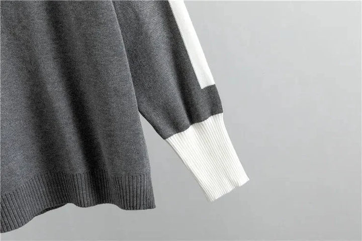 Casual chic women's color-block knit tracksuit with mock-neck top and tapered loungewear pants.