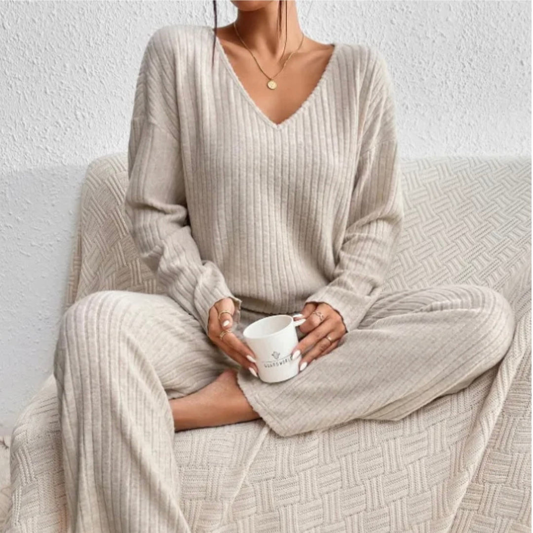 Women's knit loungewear set: V-neck top & wide leg pants. Cozy two-piece matching set for comfort.