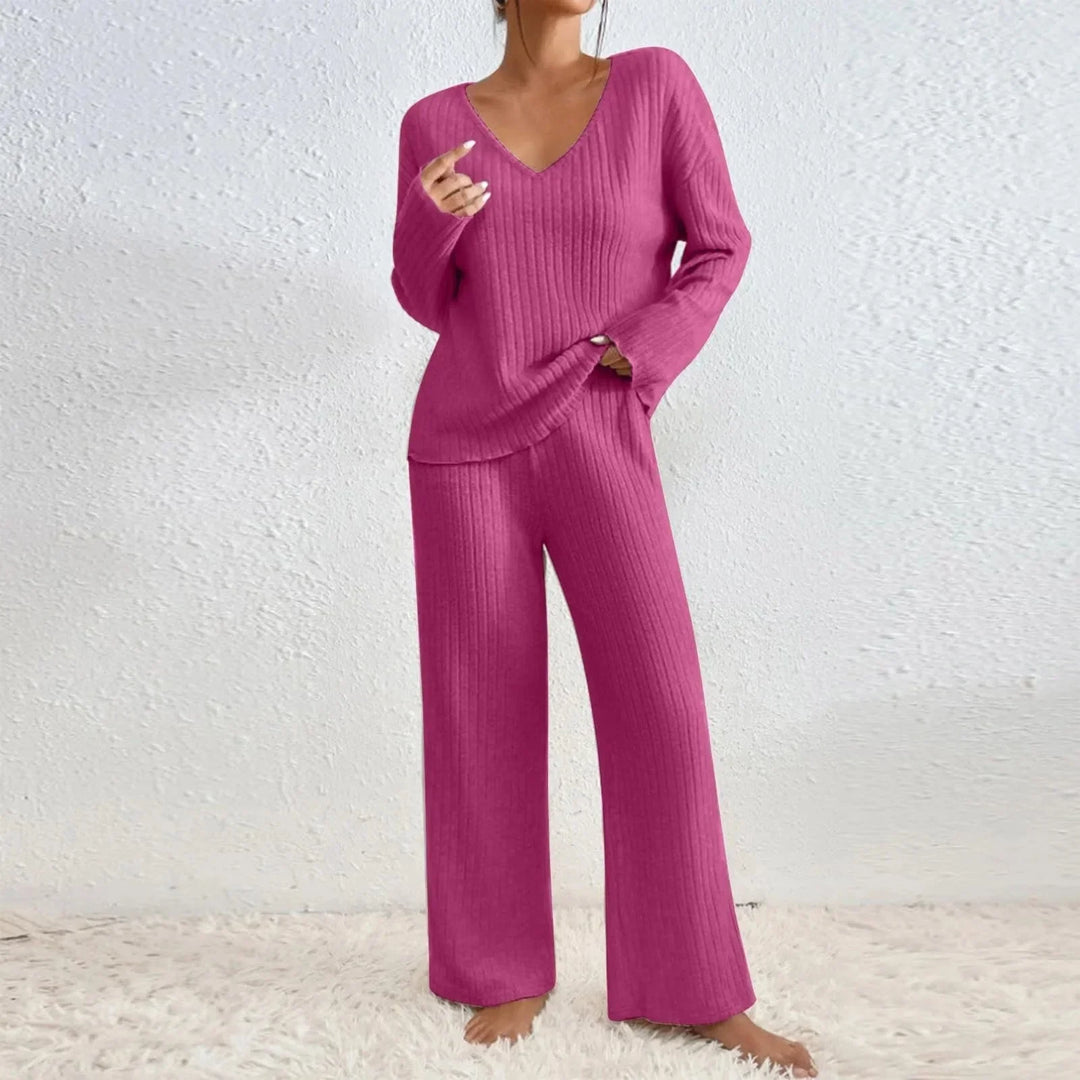 Soft women's two-piece knit set for lounging. Includes a V-neck top & comfy wide leg pants.