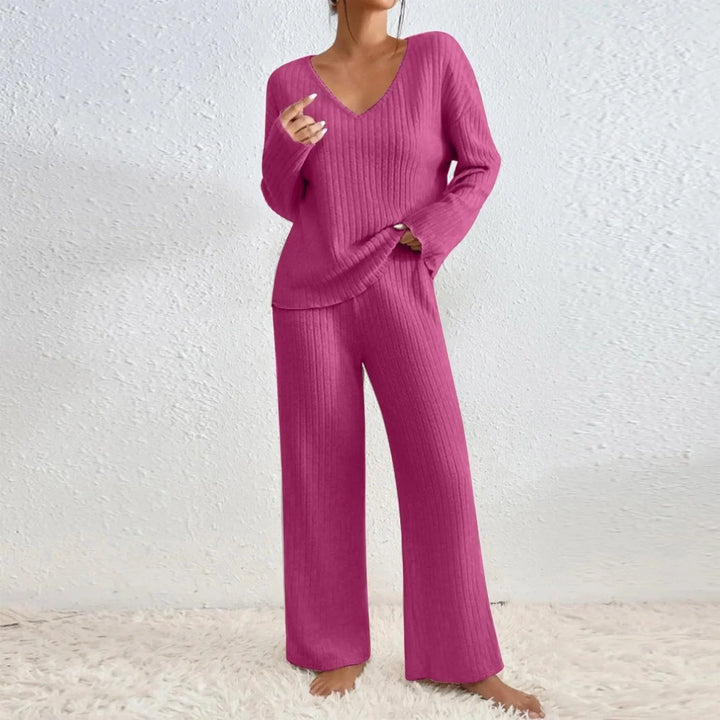 Soft women's two-piece knit set for lounging. Includes a V-neck top & comfy wide leg pants.