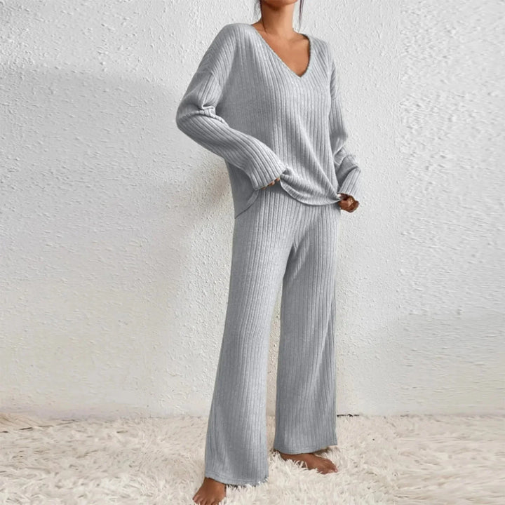 Women's knit loungewear set. V-neck long sleeve top paired with flowy wide leg pants.