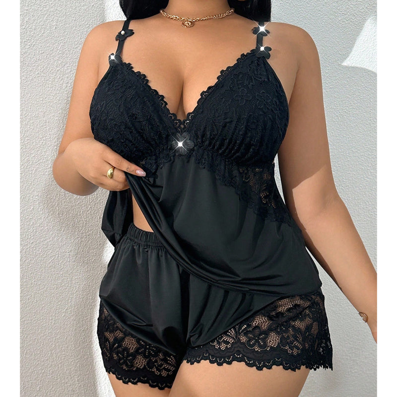 Women's lace trim satin pyjama set with shorts, luxurious feel, perfect sleepwear.