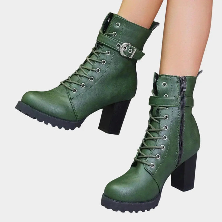 Edgy women's combat style ankle boots: lace-up, buckle strap, chunky block heel. Perfect for winter.