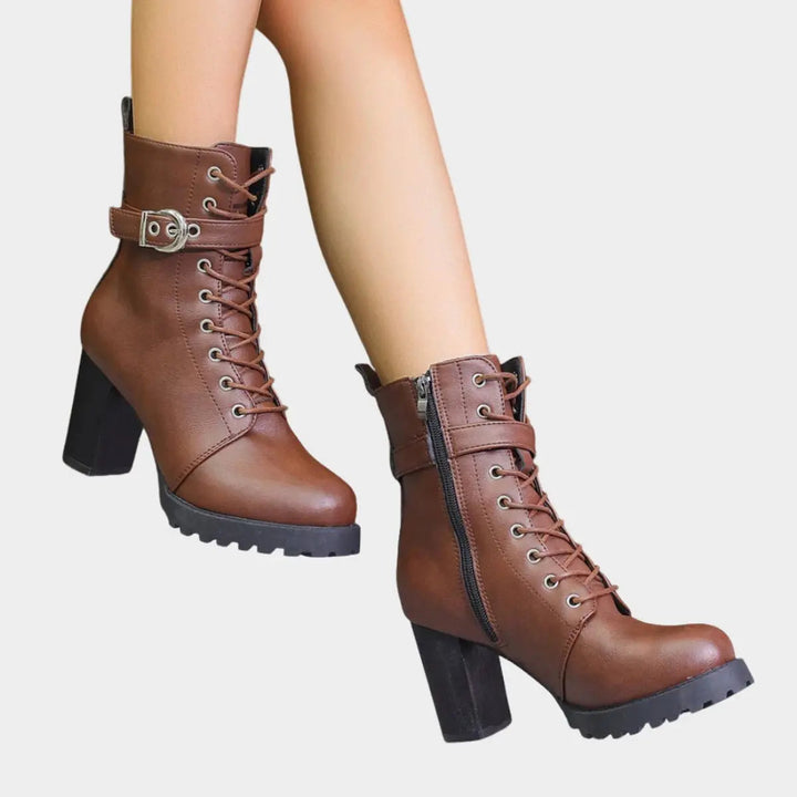 Edgy women's ankle boots: lace-up, buckle strap, block heel, and lug sole. Great for fall & winter.