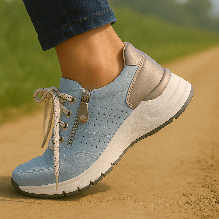 Everyday women's casual sneakers with a wedge platform, lace-up closure & convenient side zip.