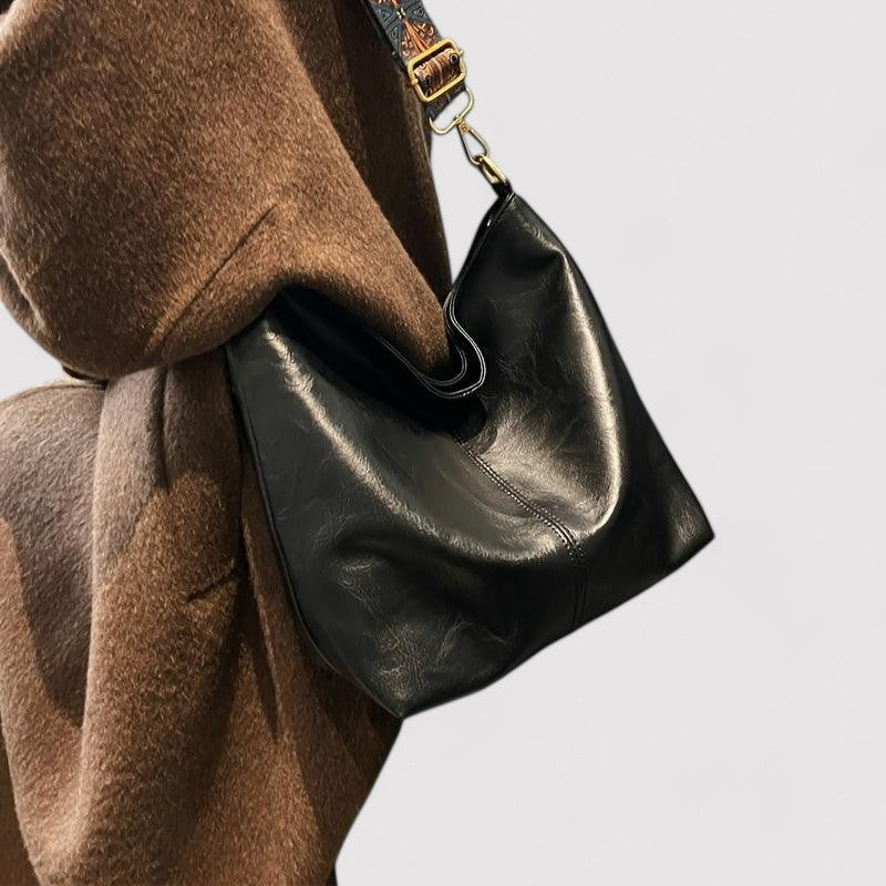 Women's large capacity genuine leather handbag, a stylish everyday shoulder bag for women.