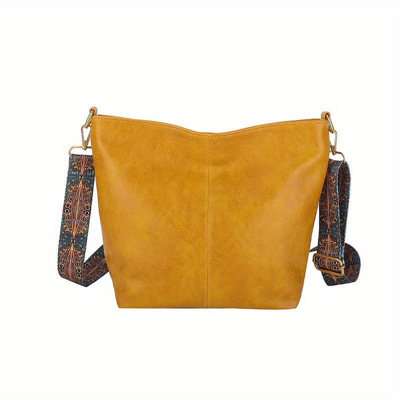 Organized women's genuine leather handbag, spacious and stylish for work or everyday use.