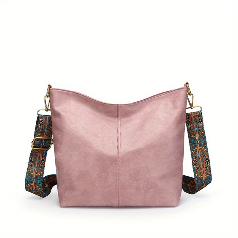 Premium genuine leather women's handbag, designed with large capacity for versatile use.