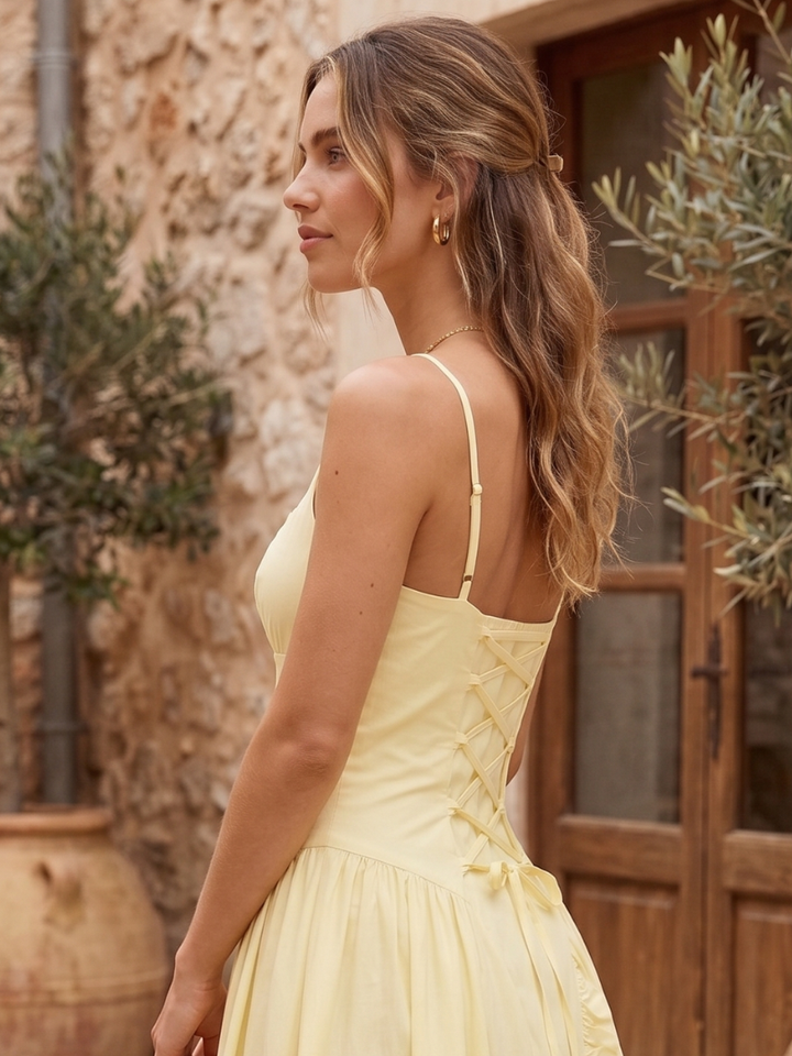 Stylish women's lemon babydoll corset midi dress with lace-up back, spaghetti straps, and sweetheart neckline for special occasions.