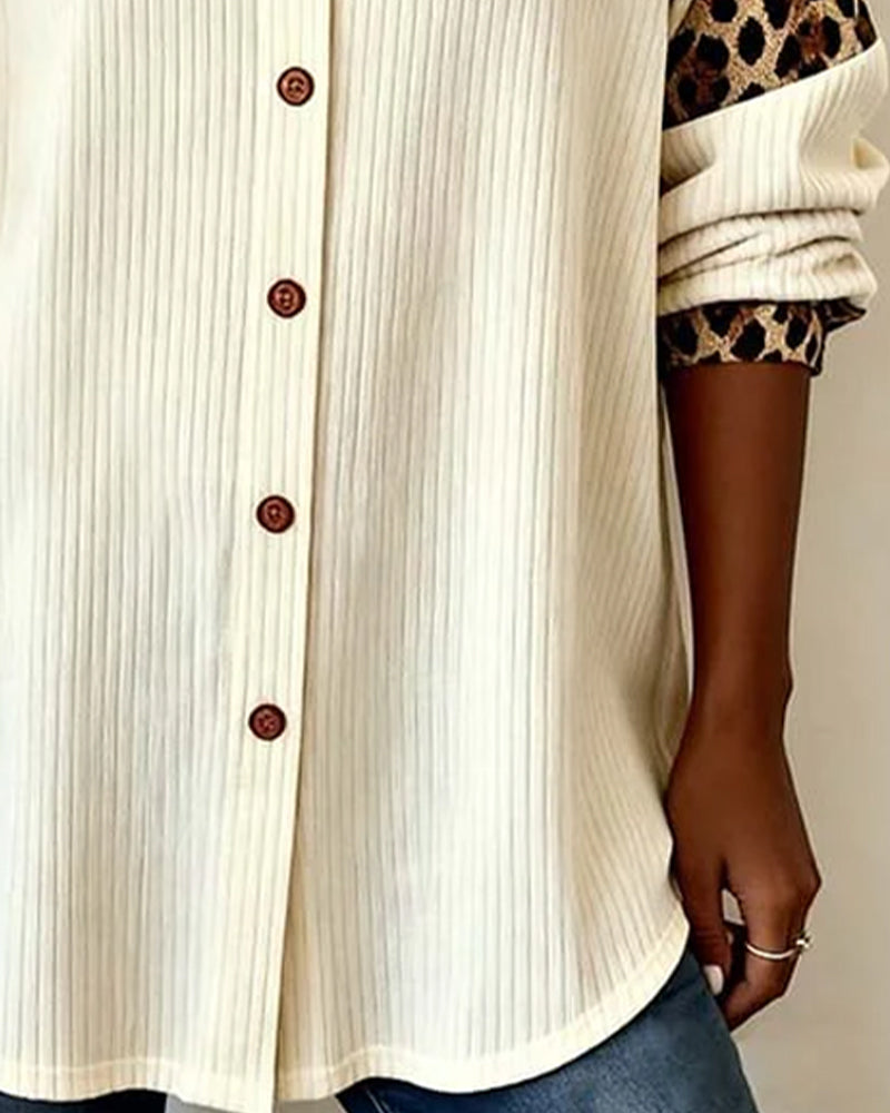 Animal print women's button-down shirt, long sleeve, relaxed fit, stylish fashion top.