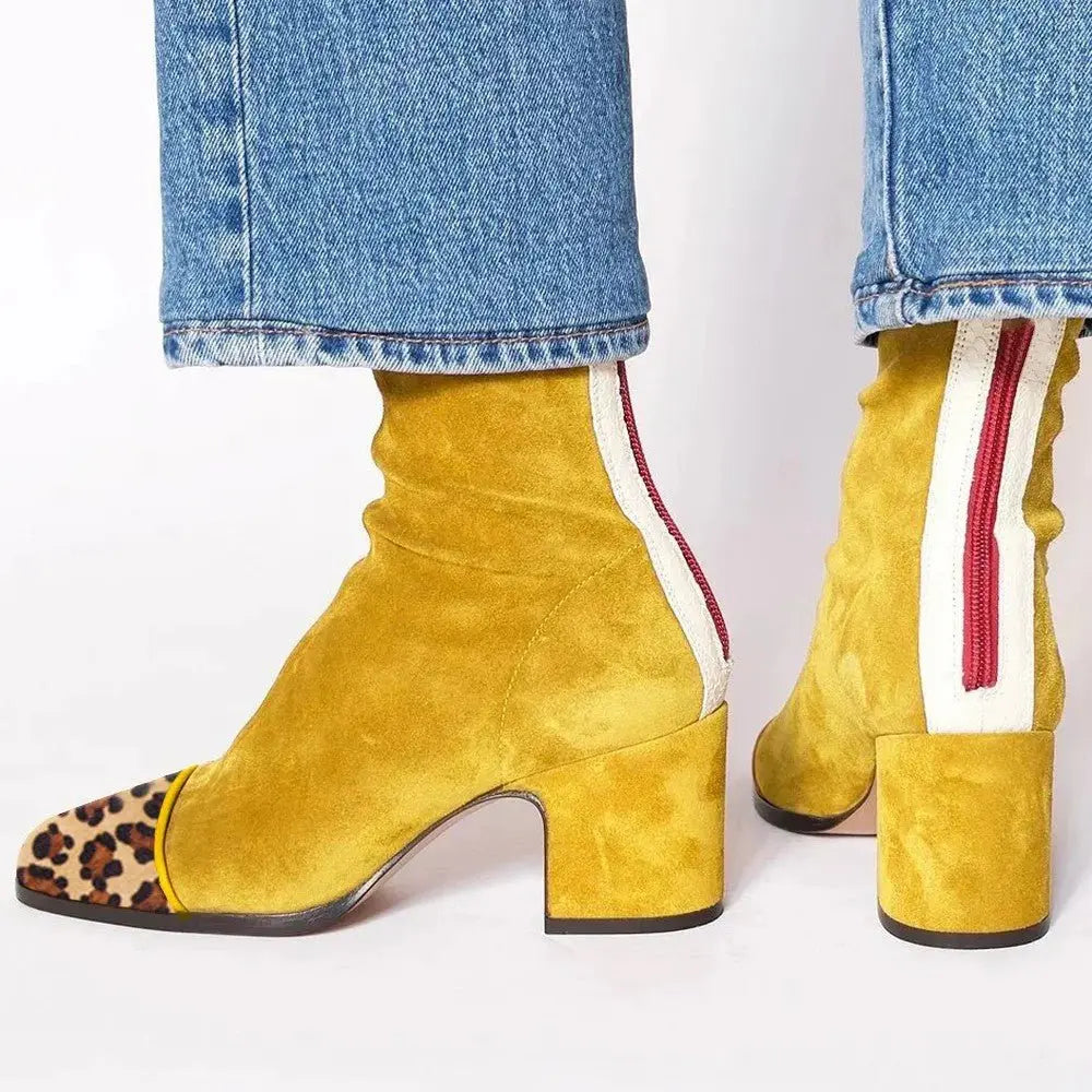 Women's leopard print square toe ankle boots with a stylish block heel for contemporary fashion.