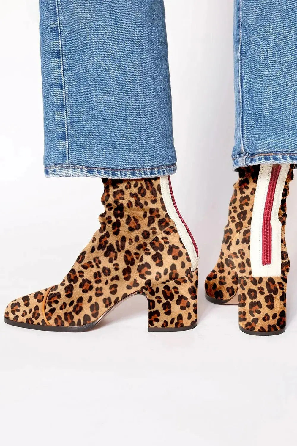 Comfortable women's square toe block heel ankle boots. Fashionable leopard print booties for style.