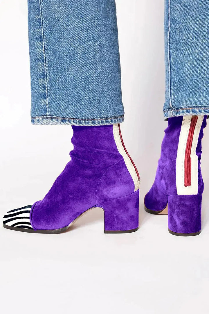 Trendy women's block heel booties with a comfortable square toe design and elegant leopard print.