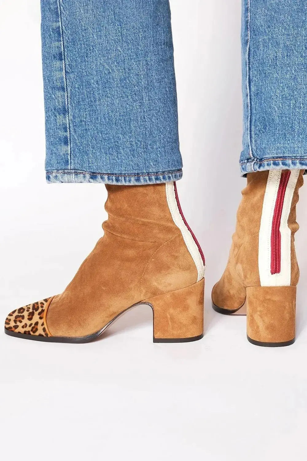 Elegant women's leopard print square toe boots, comfortable block heel for modern footwear style.