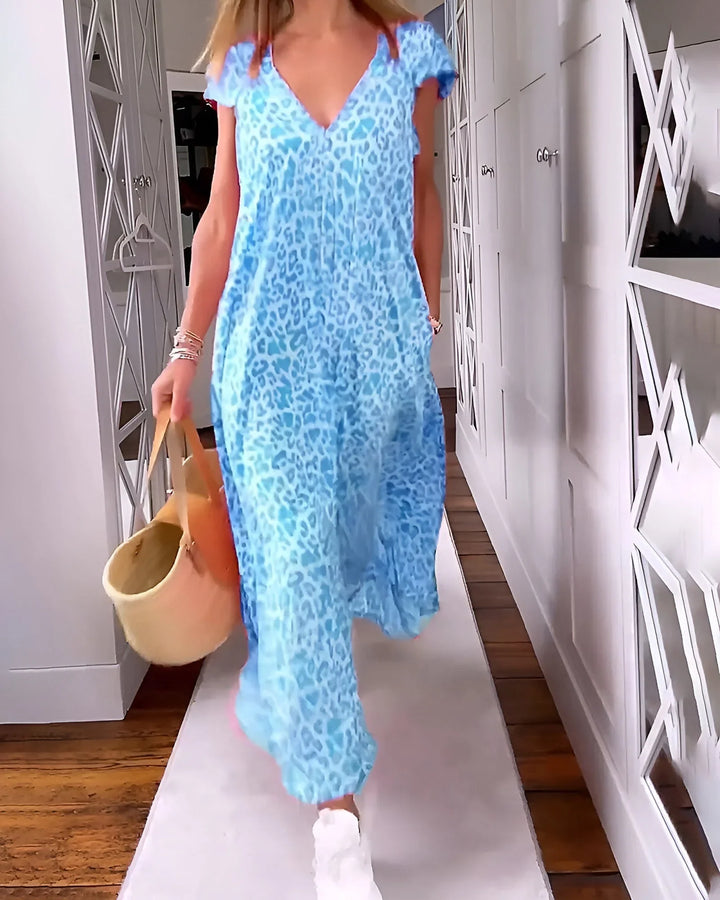 Versatile leopard print maxi dress for women. Features V-neck, short sleeves, perfect for summer style.
