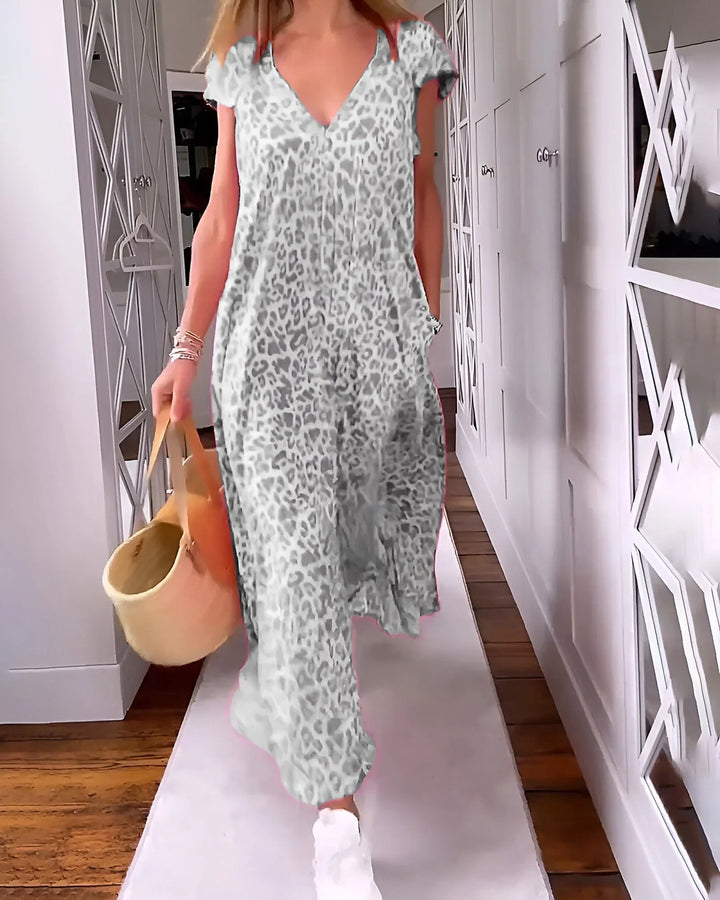 Elegant women's V-neck leopard print maxi dress with comfortable short sleeves. Loose fit design.