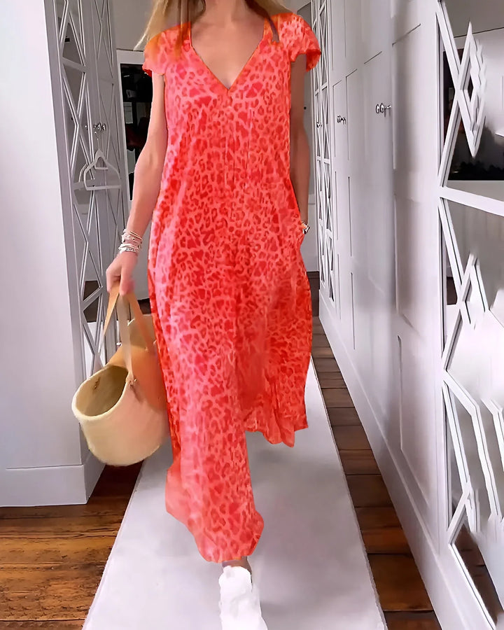 Comfortable women's leopard print maxi dress. V-neck, short sleeve, versatile for day or evening wear.