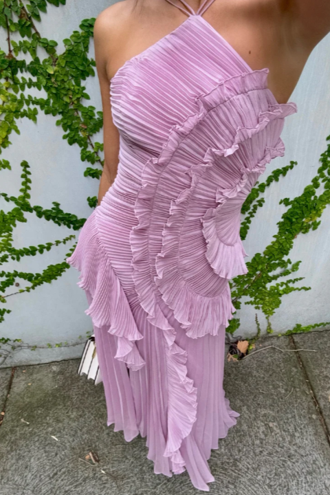 Chic pleated halter neck maxi dress for women, featuring a stylish open back and flowing light purple fabric.