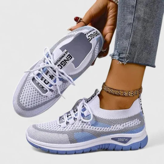 Breathable women's lightweight athletic sneakers, designed for active comfort and flexible movement.