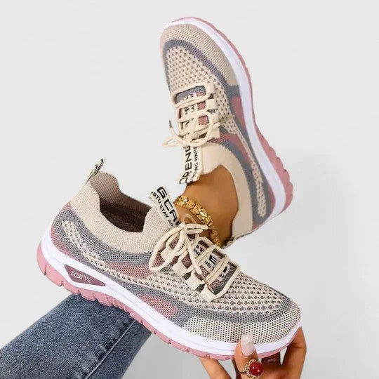 Lightweight women's athletic shoes, engineered for superior comfort during workouts & daily activities.