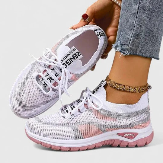 Comfortable women's lace-up sneakers featuring a modern lightweight platform sole & sporty style.