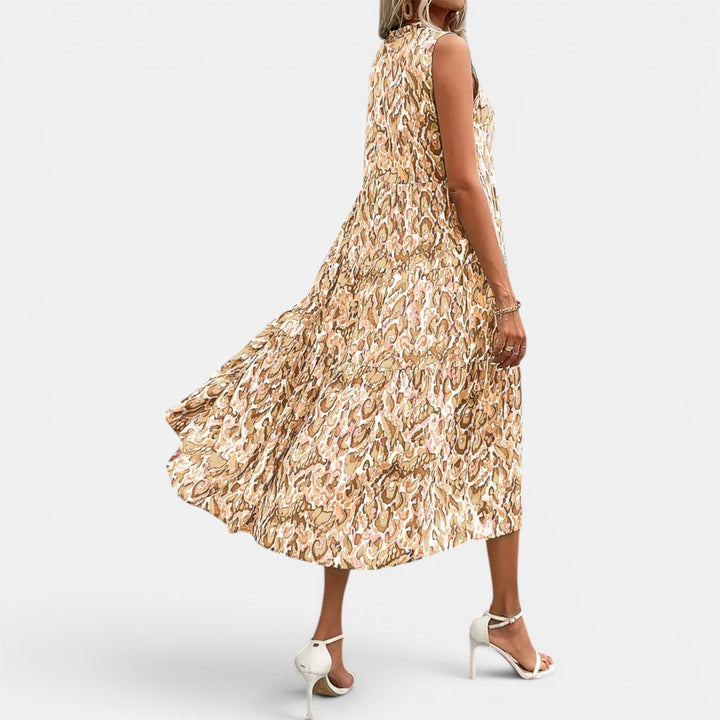 Women's flowy summer midi dress, sleeveless and elegant boho V-neck style.
