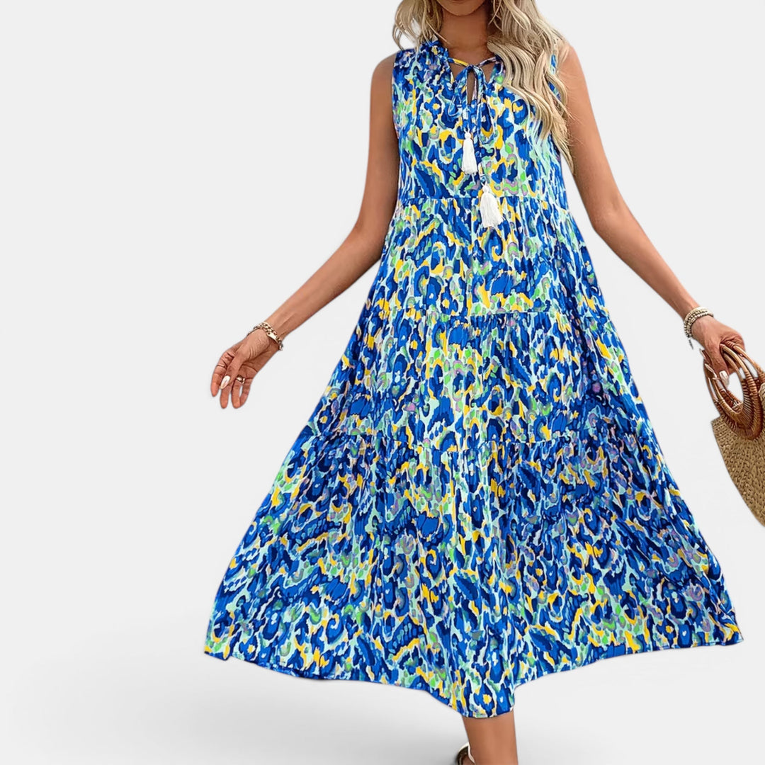 V-neck flowy midi dress, women's lightweight and printed for summer resort wear.