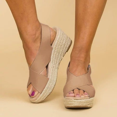 Women's lightweight closed-toe wedge sandals, offering orthopedic comfort. Ideal casual summer footwear.