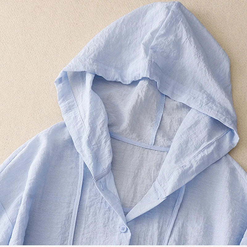 White women's lightweight crinkled hoodie, button-front design. Perfect casual jacket for spring/summer fashion.