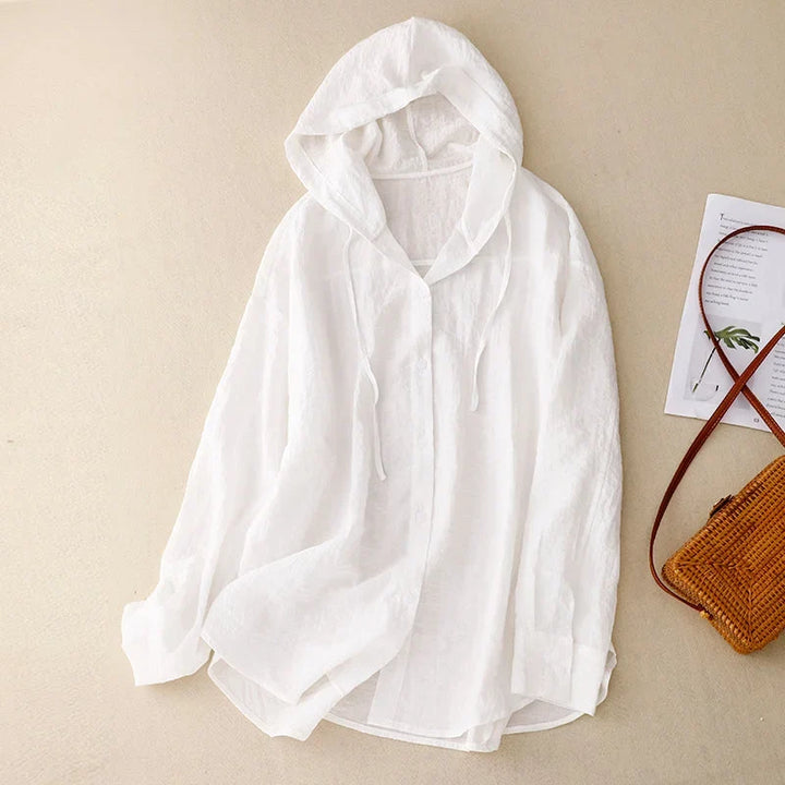 Casual women's lightweight crinkled hoodie with button-front, a comfortable and stylish top for warmer weather.