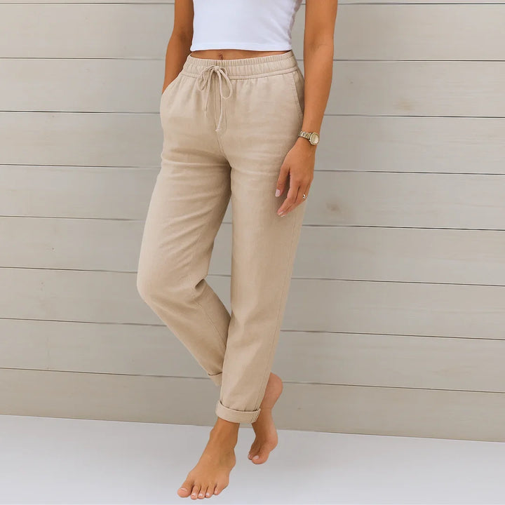 Comfortable women's drawstring pants with elastic waist & cuffed ankles, ideal for spring & summer.