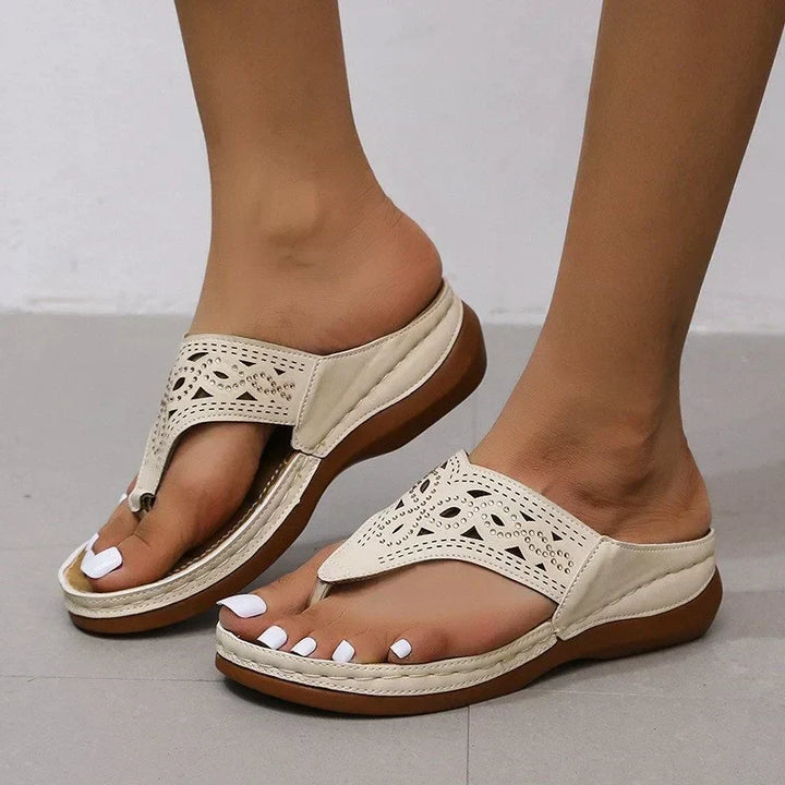 Open-toe women's sandals designed with arch support for foot health and ultimate comfort.