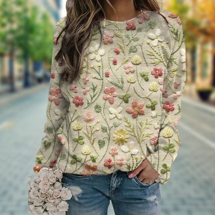 Comfortable women's spring floral embroidered crew neck top. Lightweight, long sleeve pullover, versatile casual wear.