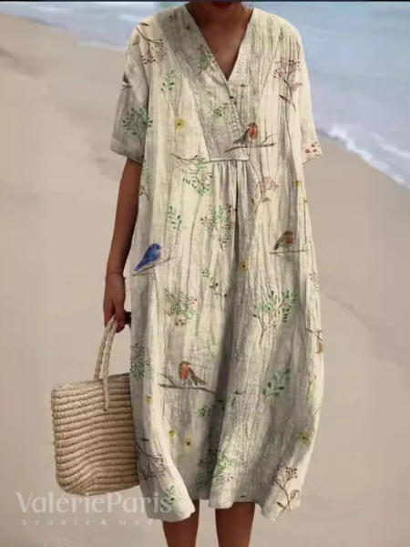 Short-sleeved floral summer dress, a must-have for your vacation wardrobe.