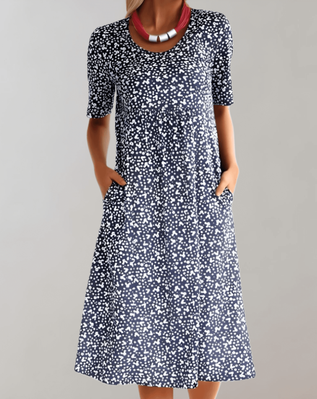 Flowy, lightweight V-neck midi summer dress for women, offering effortless style and comfort for warm days.