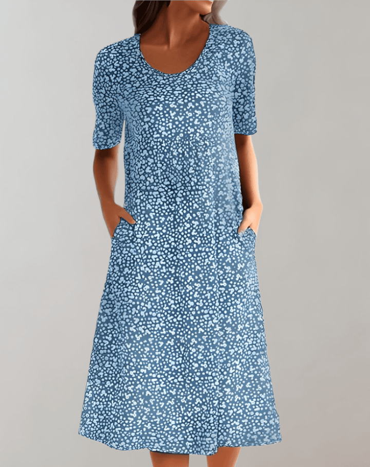 Casual women's sleeveless V-neck summer dress, a versatile midi length, ideal for vacations and everyday wear.