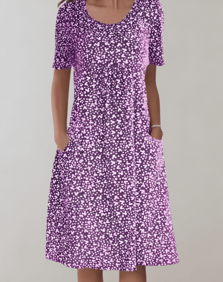 Women's flowy lightweight V-neck midi dress, sleeveless and versatile, great for summer, resort, or casual style.
