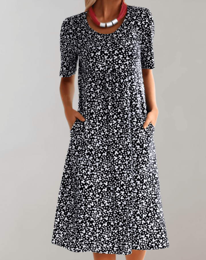 Lightweight V-neck summer dress for women, a comfortable and stylish midi perfect for casual or vacation wear.