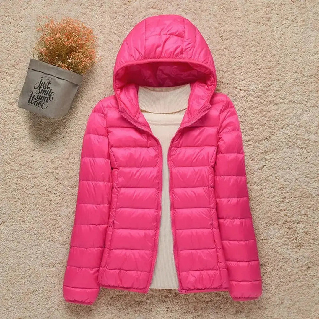 Casual women's hooded puffer jacket, quilted & lightweight. Great activewear for autumn/winter adventures.
